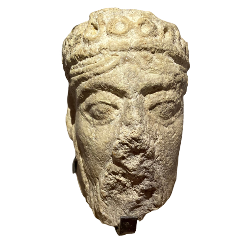 Head of crowned king.