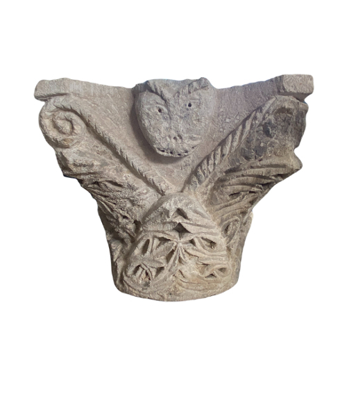 Romanesque capital sculpted on all sides.-1