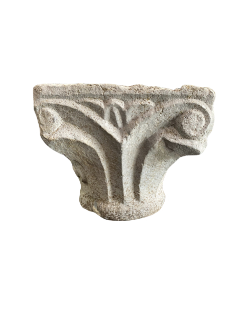 Romanesque capital decorated with masks.-2
