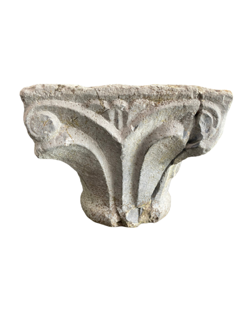 Romanesque capital decorated with masks.-3