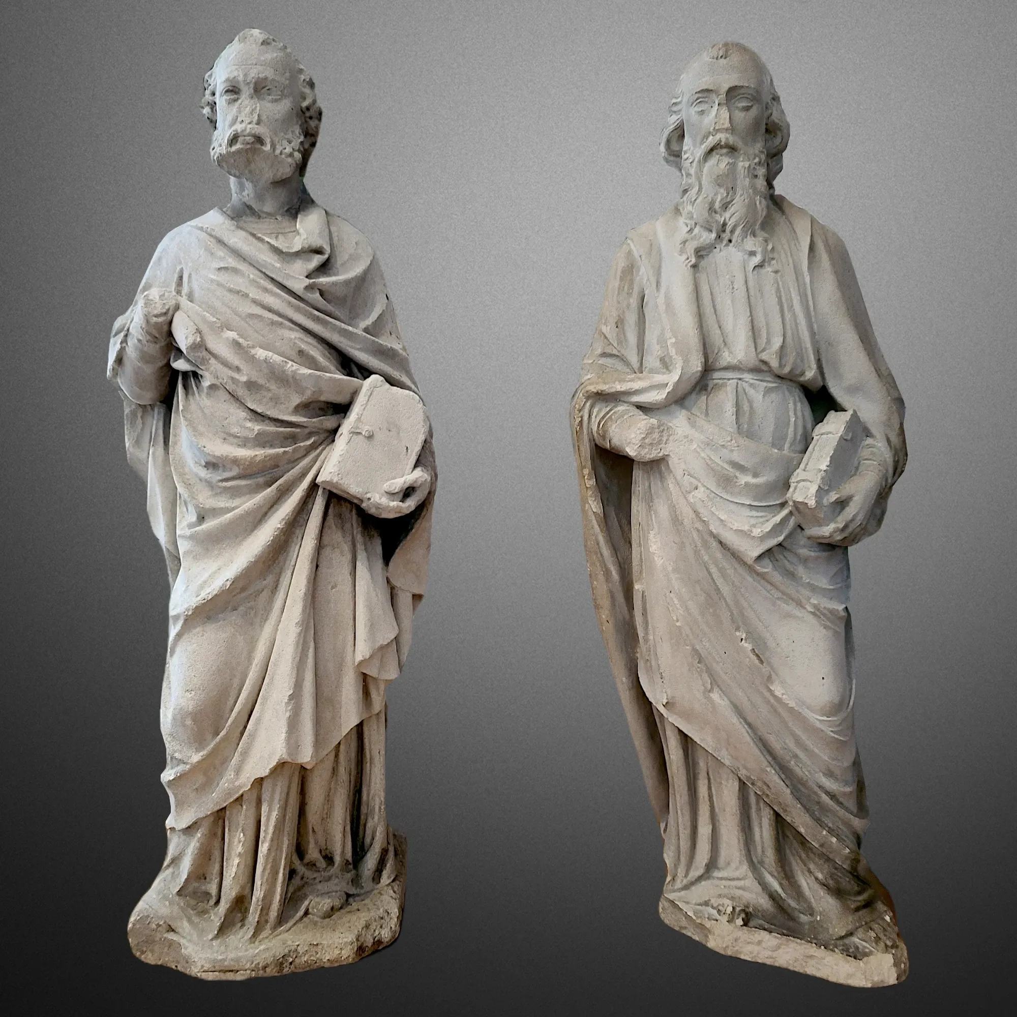 Gothic sculptures of the apostles Peter and Paul Limestone statues. Main view of the sculpture